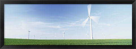 Framed Wind turbines in a field, Easington, Holderness, East Yorkshire, England Print