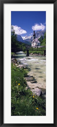 Framed Bridge over stream below country church, Bavarian Alps, Germany. Print