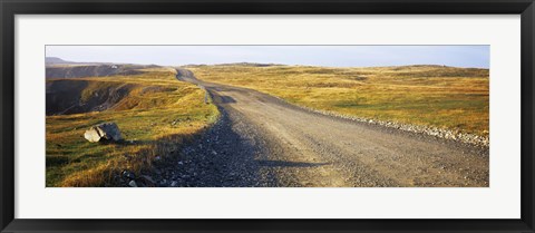 Framed Gravel road passing through a landscape, Cape Bonavista, Newfoundland, Newfoundland and Labrador, Canada Print