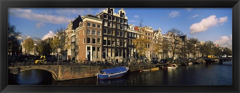 Framed Boats and Buildings along a canal, Amsterdam, Netherlands Print