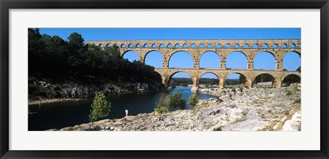 Framed Aqueduct across a river, Pont Du Gard, Nimes, Gard, Languedoc-Rousillon, France Print