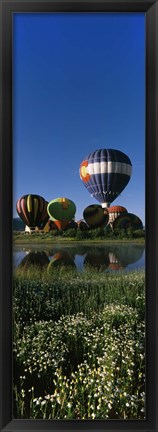 Framed Reflection of hot air balloons in a lake, Hot Air Balloon Rodeo, Steamboat Springs, Colorado, USA Print