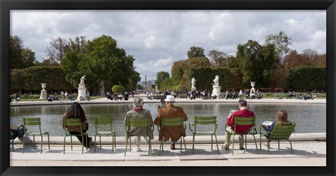 Framed Tourists sitting in chairs, Jardin de Tuileries, Paris, Ile-de-France, France Print