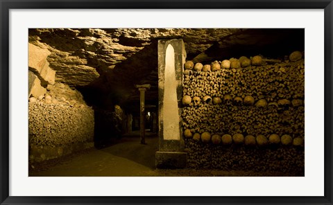 Framed Stacked bones in catacombs, Paris, Ile-de-France, France Print