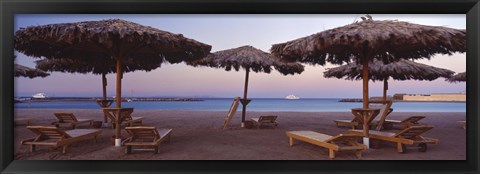 Framed Lounge chairs with sunshades on the beach, Hilton Resort, Hurghada, Egypt Print