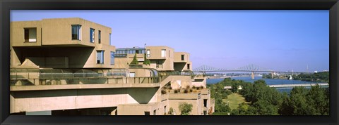 Framed Housing complex with a bridge in the background, Habitat 67, Jacques Cartier Bridge, Montreal, Quebec, Canada Print