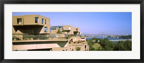 Framed Housing complex with a bridge in the background, Habitat 67, Jacques Cartier Bridge, Montreal, Quebec, Canada Print