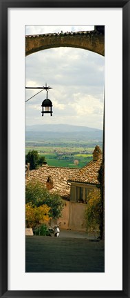 Framed Umbrian countryside viewed through an alleyway, Assisi, Perugia Province, Umbria, Italy Print