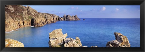 Framed Rock formations at seaside, Logan rock, Porthcurno Bay, Cornwall, England Print