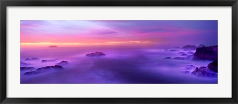 Framed Fog reflected in the sea at sunset Print