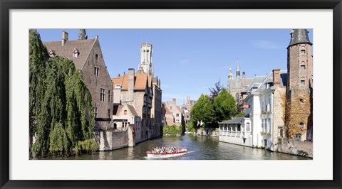 Framed Tourboat in a canal, Bruges, West Flanders, Belgium Print