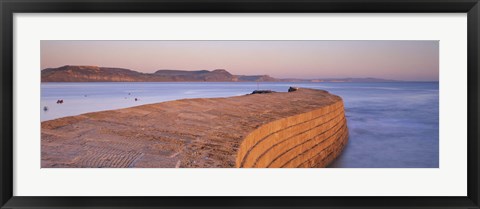 Framed Harbour wall at dusk, The Cobb, Lyme Regis, Dorset, England Print