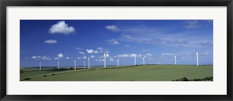 Framed Wind turbines in a farm, Newlyn Downs, Cornwall, England Print