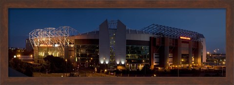 Framed Football stadium lit up at night, Old Trafford, Greater Manchester, England Print