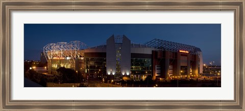 Framed Football stadium lit up at night, Old Trafford, Greater Manchester, England Print