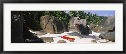 Framed Nudist corner written on a rock on the beach, Mahe Island, Seychelles Print