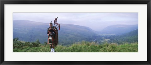 Framed Bagpiper at Loch Broom in Scottish highlands, Ross and Cromarty, Scotland Print