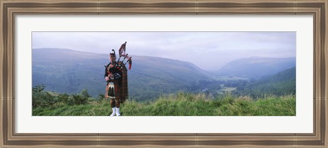 Framed Bagpiper at Loch Broom in Scottish highlands, Ross and Cromarty, Scotland Print