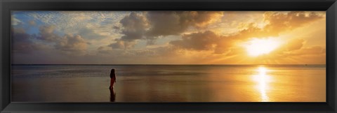 Framed Woman standing on sandbar looking at sunset, Aitutaki, Cook Islands Print