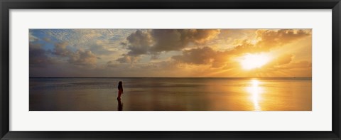 Framed Woman standing on sandbar looking at sunset, Aitutaki, Cook Islands Print