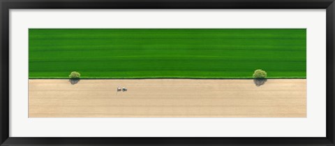 Framed Aerial view of a tractor in field Print