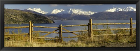 Framed Fence in front of a lake with mountains in the background, Lake General Carrera, Andes, Patagonia, Chile Print