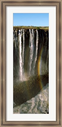 Framed Rainbow forms in the water spray in the gorge at Victoria Falls, Zimbabwe Print