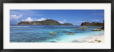 Framed Small fishing boats on Anse L&#39;Islette with Therese Island in background, Seychelles Print