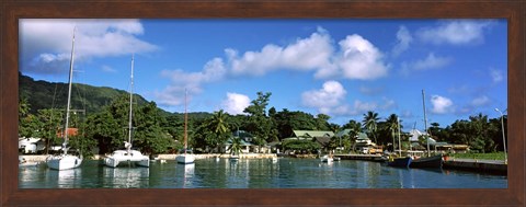 Framed Yachts and small fishing boats at the harbor on La Digue Island, Seychelles Print