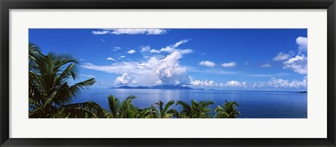 Framed Indian ocean with palm trees towards Mahe Island looking from North Island, Seychelles Print