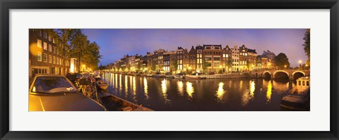 Framed Night view along canal, Amsterdam, Netherlands Print