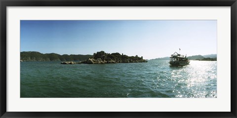 Framed Rocky island and boat in the Mediterranean sea, Sunken City, Kekova, Antalya Province, Turkey Print