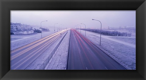 Framed Road running through a snow covered city, Reykjavik, Iceland Print