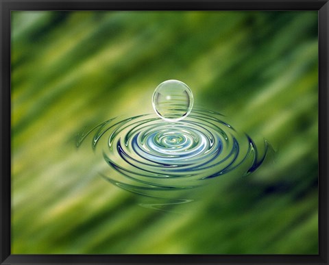 Framed Clear bubble rising from ripples in mottled green water Print