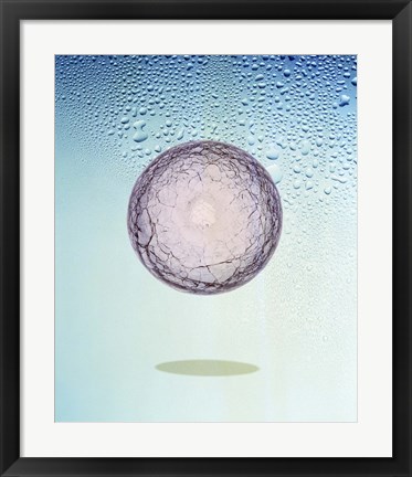 Framed Crystal sphere floating in water and bubbles Print