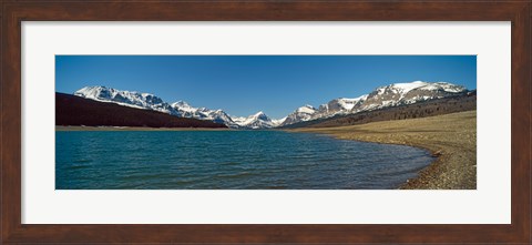 Framed Lake with snow covered mountains in the background, Sherburne Lake, US Glacier National Park, Montana, USA Print