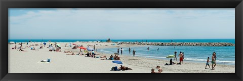 Framed Tourists on the beach, Saintes-Maries-De-La-Mer, Bouches-Du-Rhone, Provence-Alpes-Cote d&#39;Azur, France Print