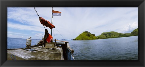 Framed Boat in the sea with islands in the background, Flores Island, Indonesia Print