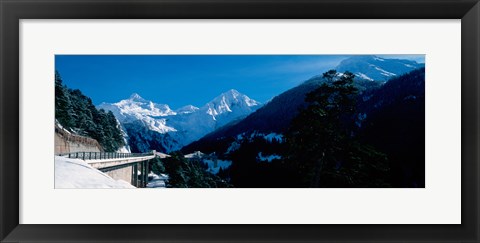 Framed Bridge through Snowcapped mountain range, Valais Canton, Switzerland Print