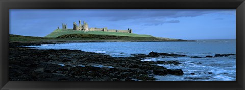 Framed Dunstanburgh Castle at the coast, Northumberland, England Print