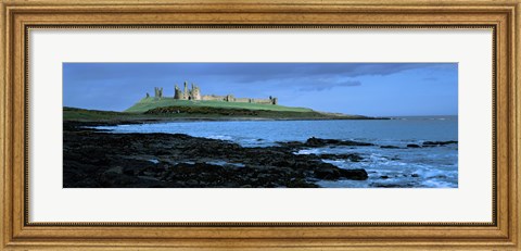 Framed Dunstanburgh Castle at the coast, Northumberland, England Print