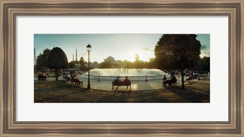 Framed People sitting at a fountain with Blue Mosque in the background, Istanbul, Turkey Print