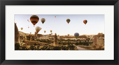 Framed Hot air balloons over landscape at sunrise, Cappadocia, Central Anatolia Region, Turkey Print