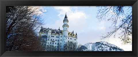 Framed Low angle view of the Neuschwanstein Castle in winter, Bavaria, Germany Print