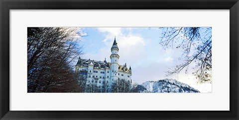 Framed Low angle view of the Neuschwanstein Castle in winter, Bavaria, Germany Print