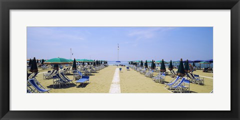 Framed Deck chairs and umbrellas on the beach, Viareggio, Tuscany, Italy Print