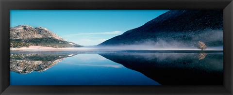 Framed Reflection of a mountain with snowy trees on a lake in winter afternoon, Cote d&#39;Azur, France Print