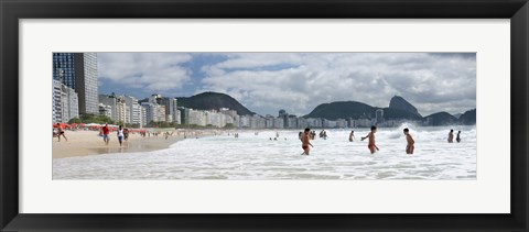 Framed People enjoying on Copacabana Beach with Sugarloaf Mountain in background, Rio De Janeiro, Brazil Print