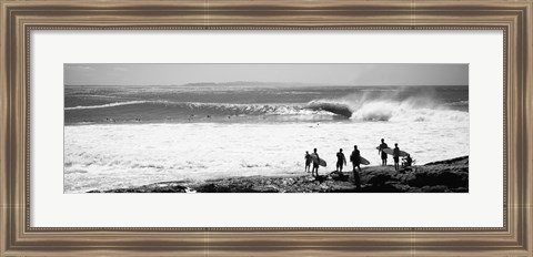 Framed Silhouette of surfers standing on the beach, Australia (black and white) Print