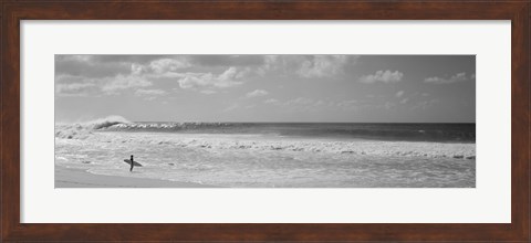 Framed Surfer standing on the beach in black and white, Oahu, Hawaii Print